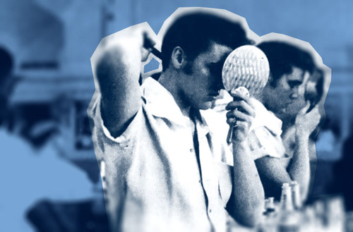 Elvis looking in the mirror