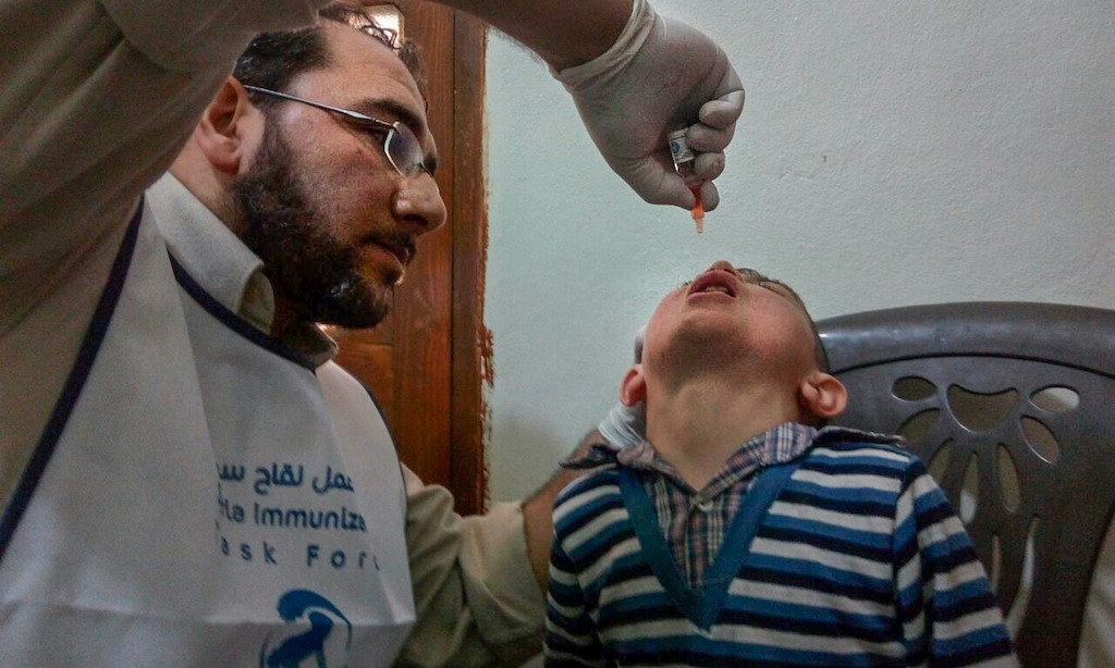 Dr.Hussein treating a child in an MSF supported hospital in east Aleppo. Photographer: Hospitals of Aleppo/MSF