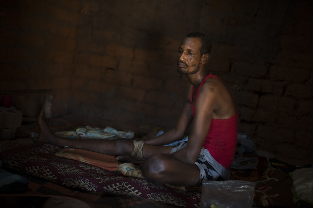 Credit Colin Delfosse. Michel, 38. He was shot on 21 November during the Gobolo neighbourhood attack. . He is now stuck in the enclaved neighbourhood of Bria that he can’t leave.