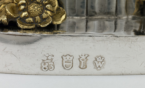 Detail van een Leuvens keurmerk