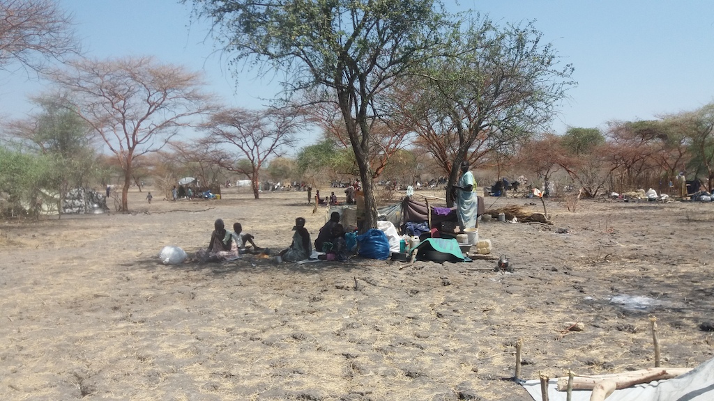 In Aburoch, people are sleeping under trees with the little plastic sheeting they managed to find. Most of the people who fled Wau Shilluk left all their belongings behind. They walked for days to escape the violence, and now they are now in dire need of water, food, shelter and medical attention. Photographer: Elena Grandio