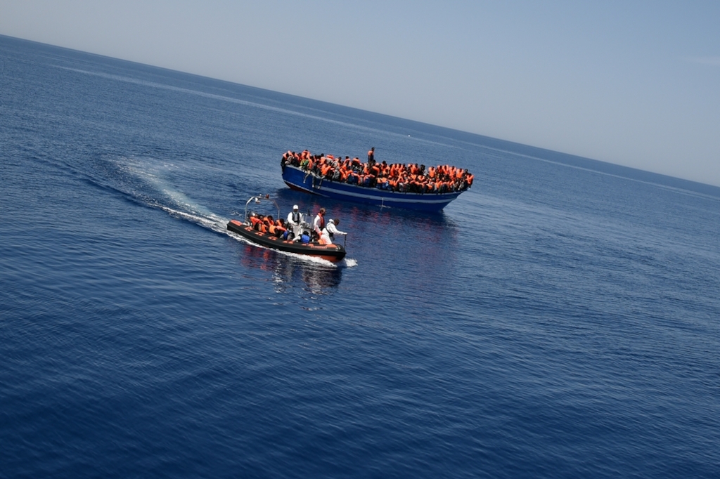 System identifier<br/>: MSF150650<br/>Title<br/>: Bourbon Argos rescues in the Mediterranean (July-August 2015)<br/>Photographer / cameraman<br/>: Christophe Stramba-Badiali<br/>Countries:<br/>Italy<br/>Description<br/>: Prior to embarkation on board the Bourbon Argos. MSF and MOAS rescue team assisted 369 people in distress found on a that 12 meters wooden boat in the Mediterranean sea. <br/><br/>Will Turner (Emergency Coordinator) and MOAS rescue team on board of the RHIB. <br/><br/>As part of the rescue operation, the team will provide people first with life jackets to prevent drowning and then operate transfer onto the MY Phoenix. <br/><br/>During transfer, the Rhib can take between 10 to 20 people on board. The team have to do many rides before taking everybody safe on board of the MY Phoenix.