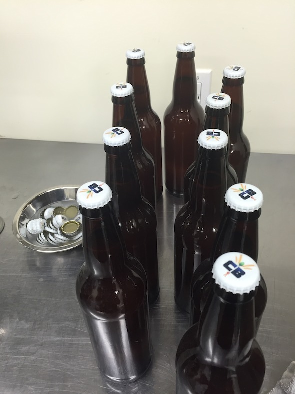 Capped bottles of Worth the Wait Cantaloupe Gose will be conditioned for 2 weeks before they're ready to drink.