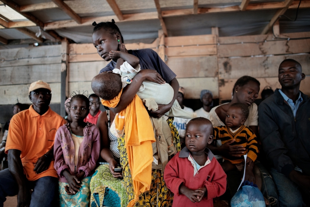 MSF159677<br/>People wait to be seen at a Medecins Sans Frontiers (MSF) hospital at a displaced persons camp in M'Poko, Bangui.