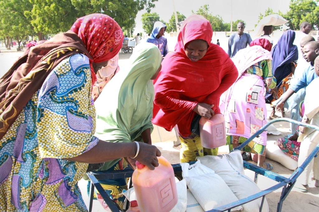 Hauwa Abba, 55, fled her home in Abadan two years ago, and now lives in a camp in Maiduguri. They were one of 500 families to receive a food from MSF on December 14, 2016. Photographer: Malik Samuel/MSF