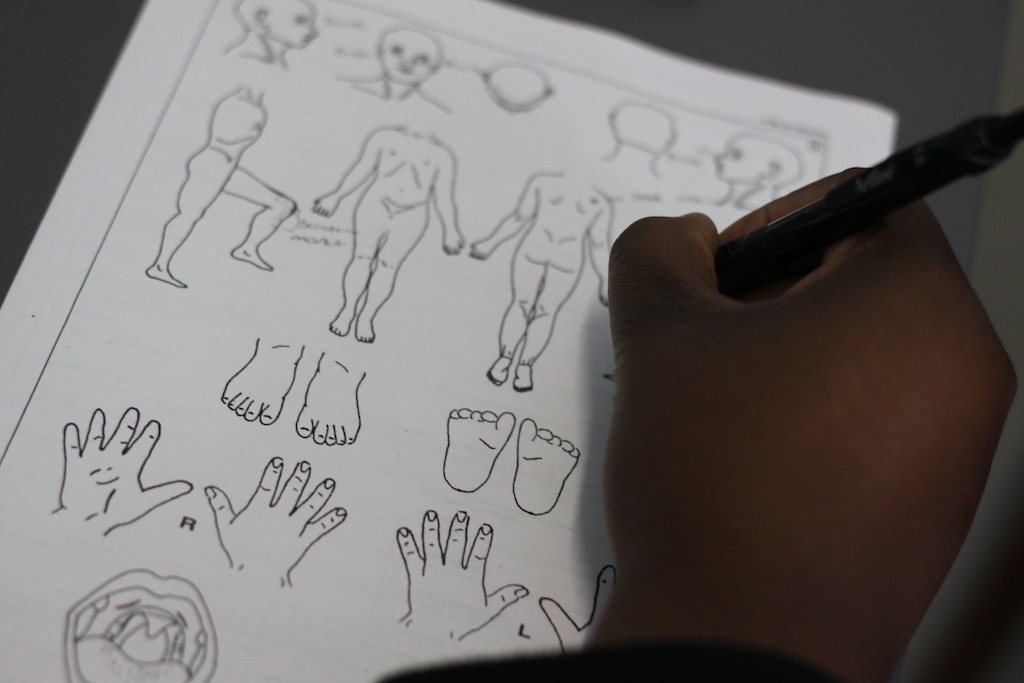 A nurse uses diagrams of the human body as a forensic tool with children who may have been abused in Rustenburg, a large mining town in the so-called Platinum Belt of South Africa. A recent MSF survey showed that 1 in 4 women living in Rustenburg Municipality have experienced rape in their lifetime, but 95% have never told a health professional about it. At the same time fewer than 50% know about getting medical treatment after being raped.<br/>Photographer: Garret Barnwell