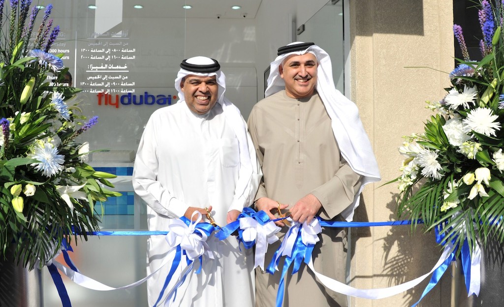 Hamad Obaidalla (left) and Sheikh Khalid Abdulaziz Al Qasimi open the new flydubai Travel Shop in Sharjah