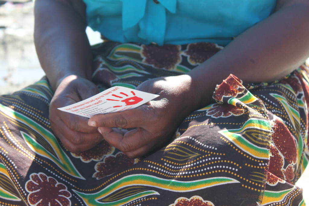 Mozambican woman holding health promotion material. Many women living in the mining town of Rustenburg migrate from South Africa’s rural areas and surrounding countries. MSF currently provides services for survivors of sexual violence. 1 in 4 women have been raped in Rustenburg Municipality.<br/>Photographer: Garret Barnwell