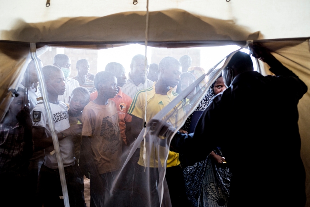 System identifier<br/>: MSF145894<br/>Title<br/>: Meningitis Epidemic in Niger<br/>Photographer / cameraman<br/>: Sylvain Cherkaoui<br/>Countries:<br/>Niger<br/>Description<br/>: Patients wait their turn to come in the ambulatory.