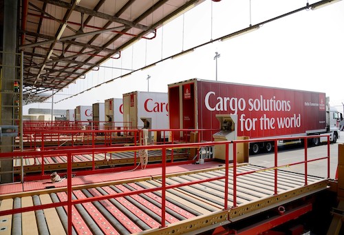 Offloading cargo bound for the SkyCargo warehouse at DWC