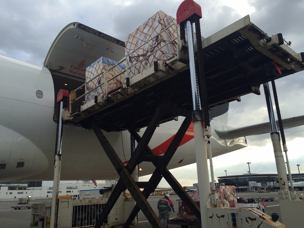 The machinery and steel parts for the bridge being loaded onto an Emirates SkyCargo Boeing 777 Freighter at Tokyo’s Narita International Airport