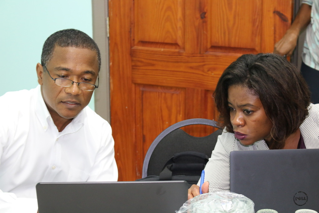 Representatives from the OECS Commission's Legal Unit provide advice to the Working Group.