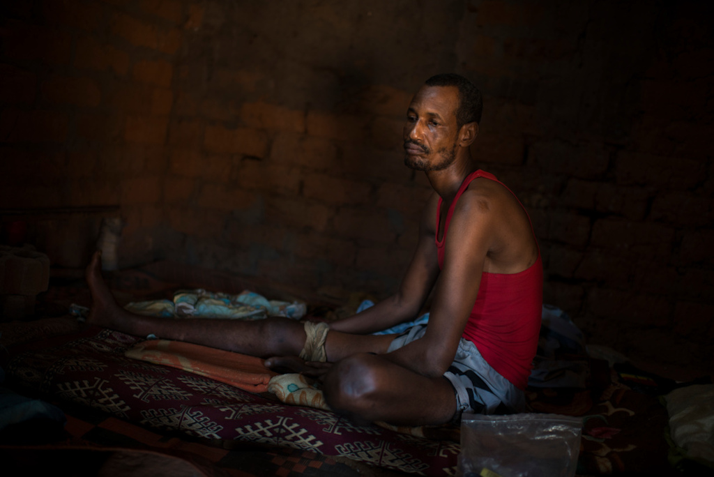 Michel, 38,. He was shot on 21 November during the Gobolo neighbourhood attack. . He is now stuck in the enclaved neighbourhood of Bria that he can’t leave. <br/>Photographer: Colin Delfosse