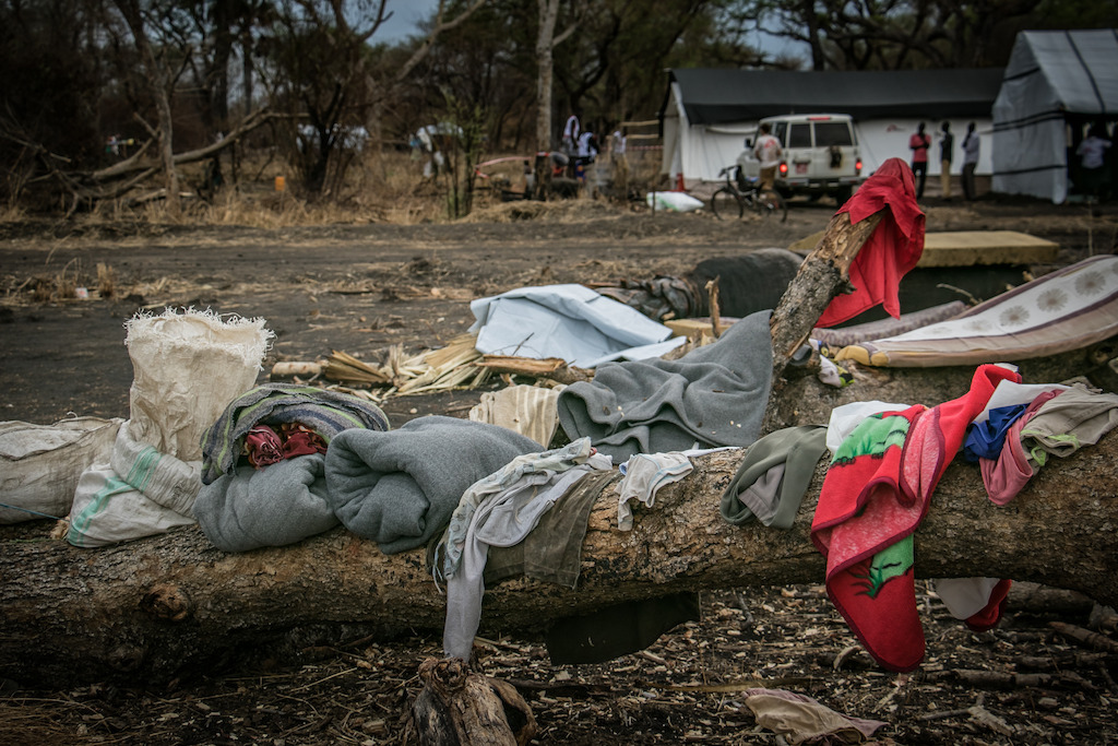 Clothes are hung out to dry as heavy rain drenched parts of Palorinya refugee camp, Uganda. In some parts of the camp people sleep under poorly constructed shelters which offer very little protection from the rain. The situation will only get worse, a rainy season approaches. Photographer: Fabio Basone/MSF