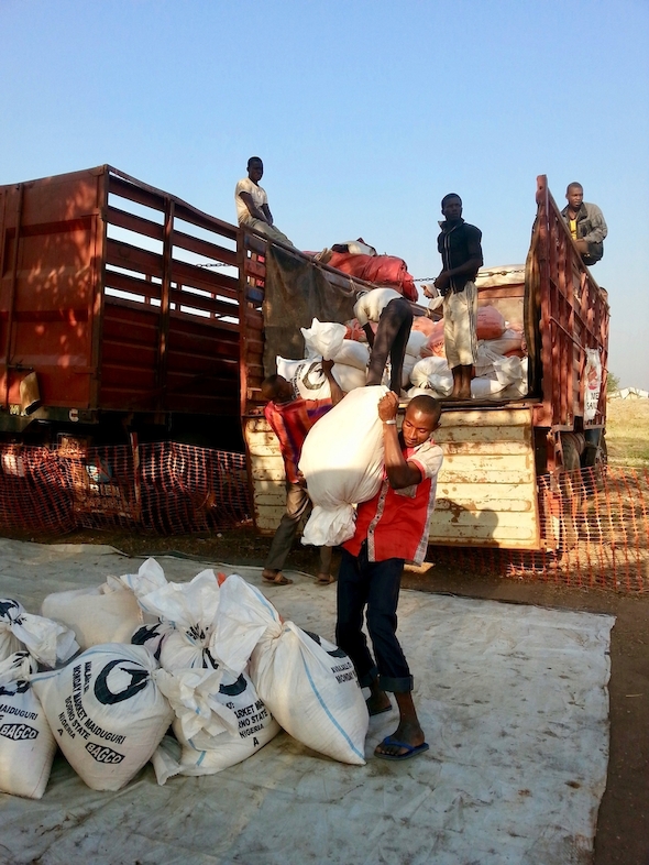 MSF team unloads sacks of rice to be distributed in Kabo, northern CAR. Photographer: MSF