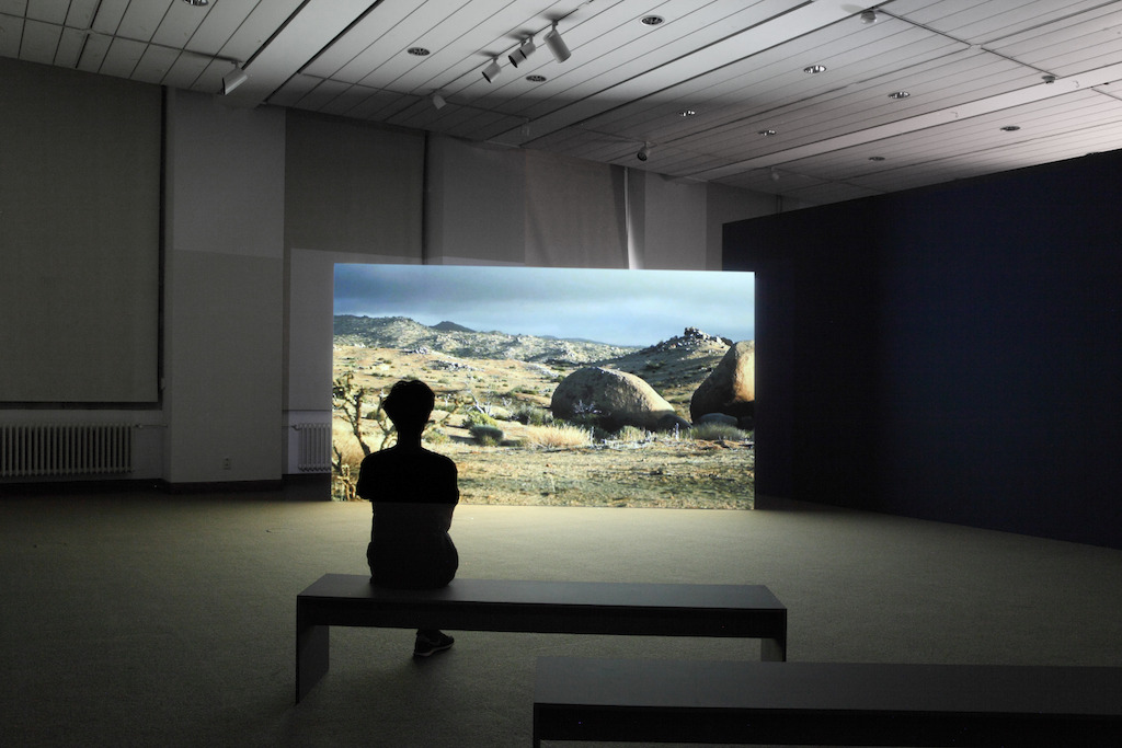 Medium Earth (film still) 2013 by The Otolith Group. Courtesy and copyright the artists.<br/>Installatie Universiteitsbibliotheek KU Leuven - Tracing The Future<br/>Foto (c) Dirk Pauwels
