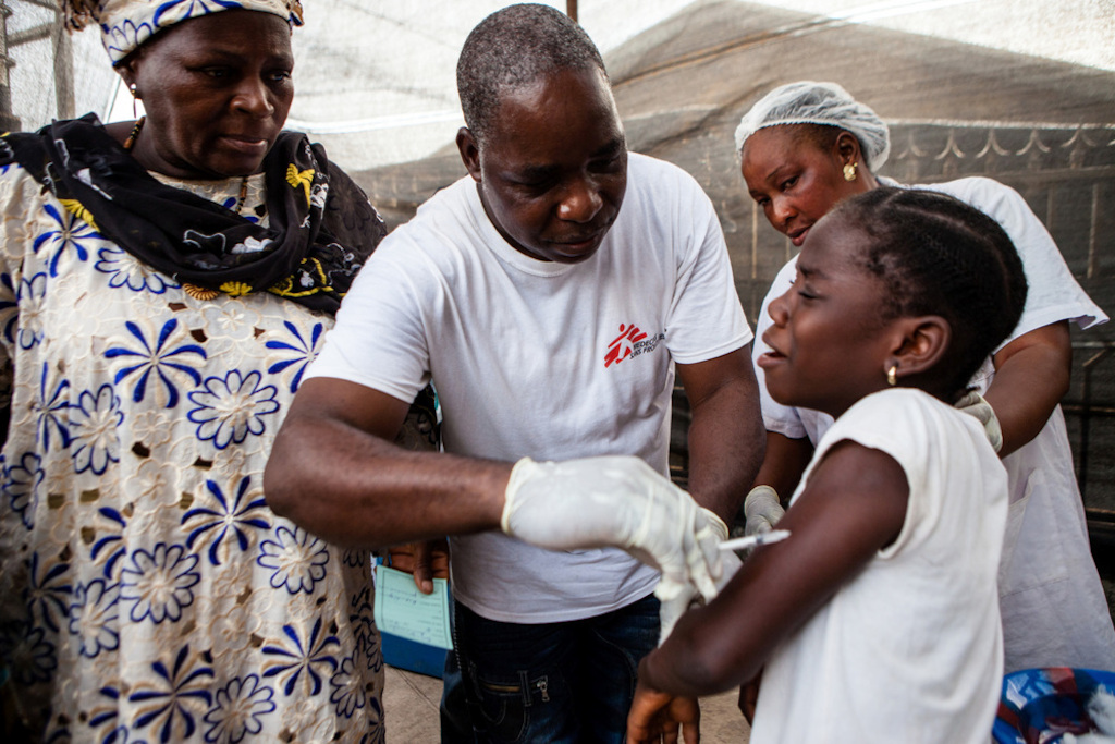 Children are vaccinated during the first day of a Measles vaccination programme in Conakry, the capital of Guinea. Photographer: Markel Redondo