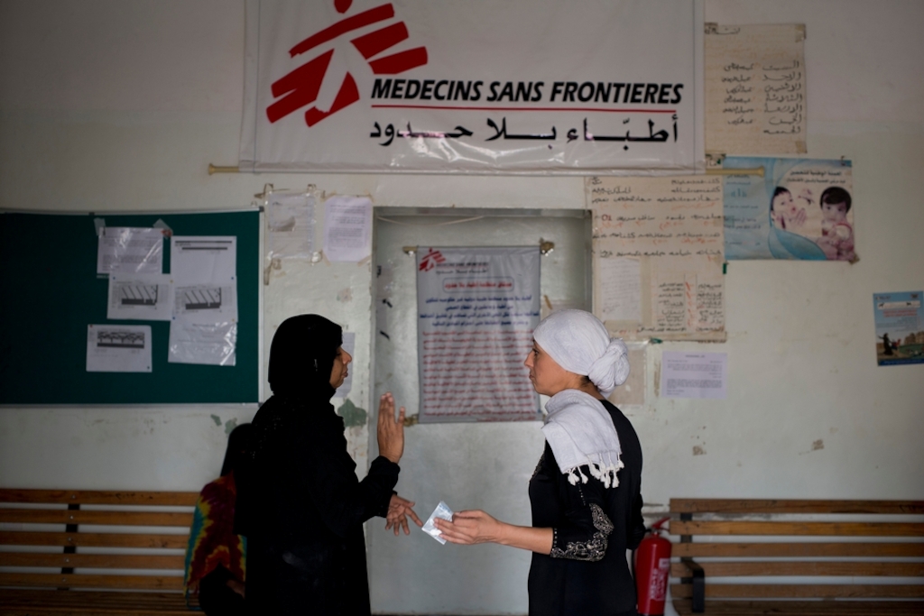 MSF medical Doctor, Nora<br/>Echaibi (right) and medical doctor Kalyanasundari<br/>Gomathinayagam speak together near the<br/>entrance of Al Salam Hospital on July 22,<br/>2015 in Qataba, Yemen.<br/>Credit: Alex Potter