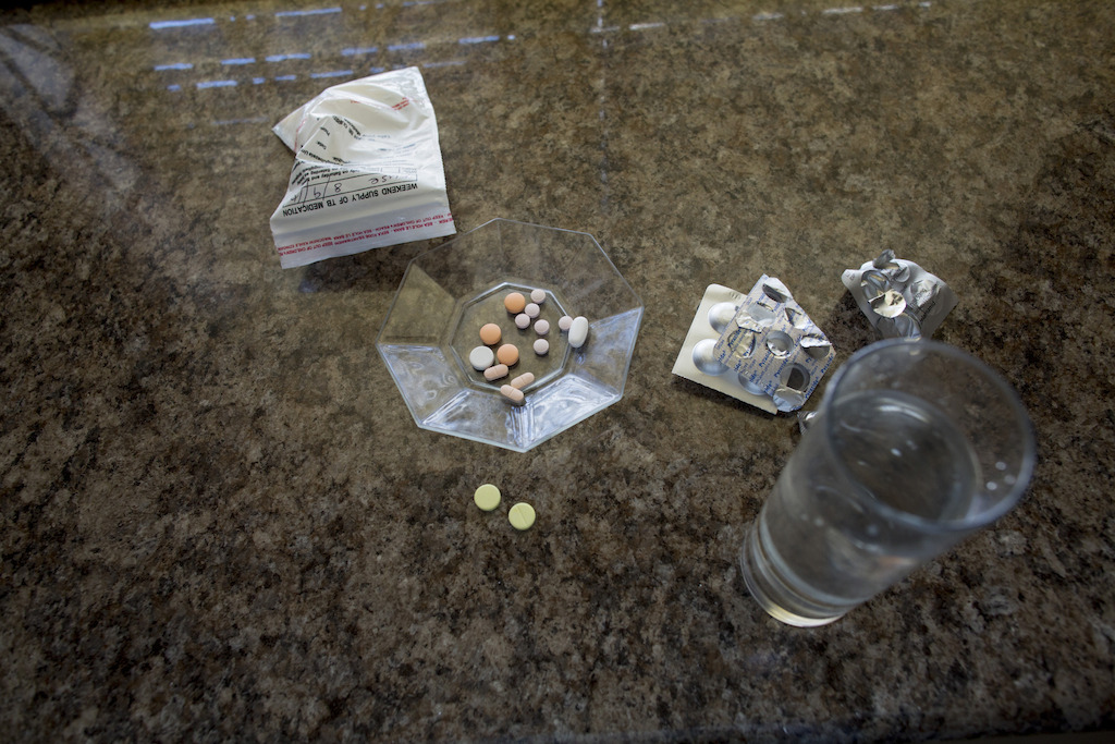 Sinethemba takes her daily regimen for XDR-TB at 10am each day, with two additional delamanid tablets at night.<br/><br/>Sinethemba, 16 years, lives with her grandmother, Vuyisiwa Madubela, and four other family members in a two-bedroomed home in Zone C29, Khayelitsha, Western Cape, South Africa.<br/><br/>Her grandmother’s determination and love, combined with receiving a six-month trial of one the newest DR-TB drugs on the market likely saved her life this year. <br/><br/>Current regimen: delamanid, linezolid, pyrazinamide, ethambutol, clofazimine, high dose levofloxacin, terizidone. Photographer: Sydelle WIllow Smith